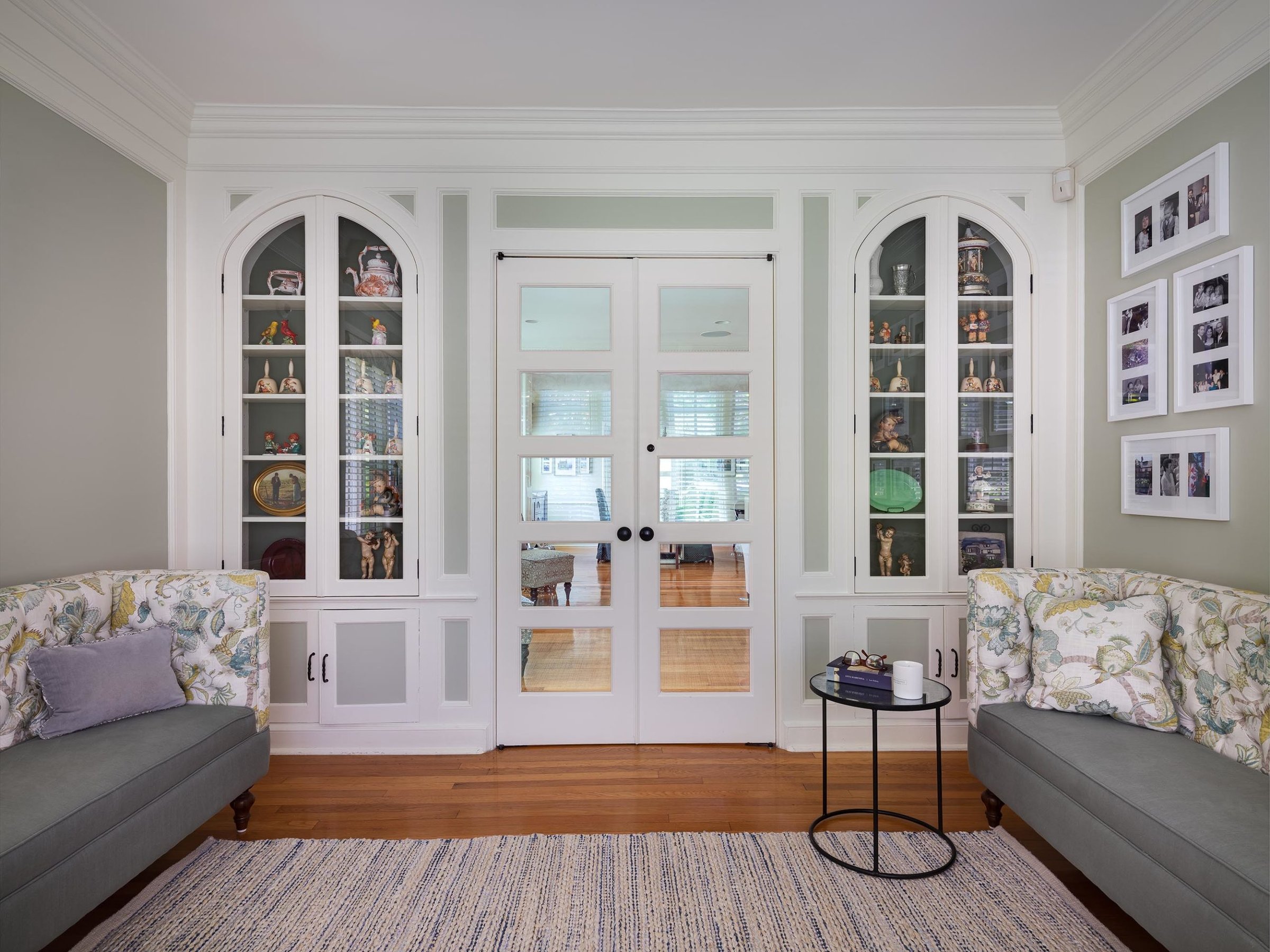 Living Room with Custom Cabinetry and French Doors