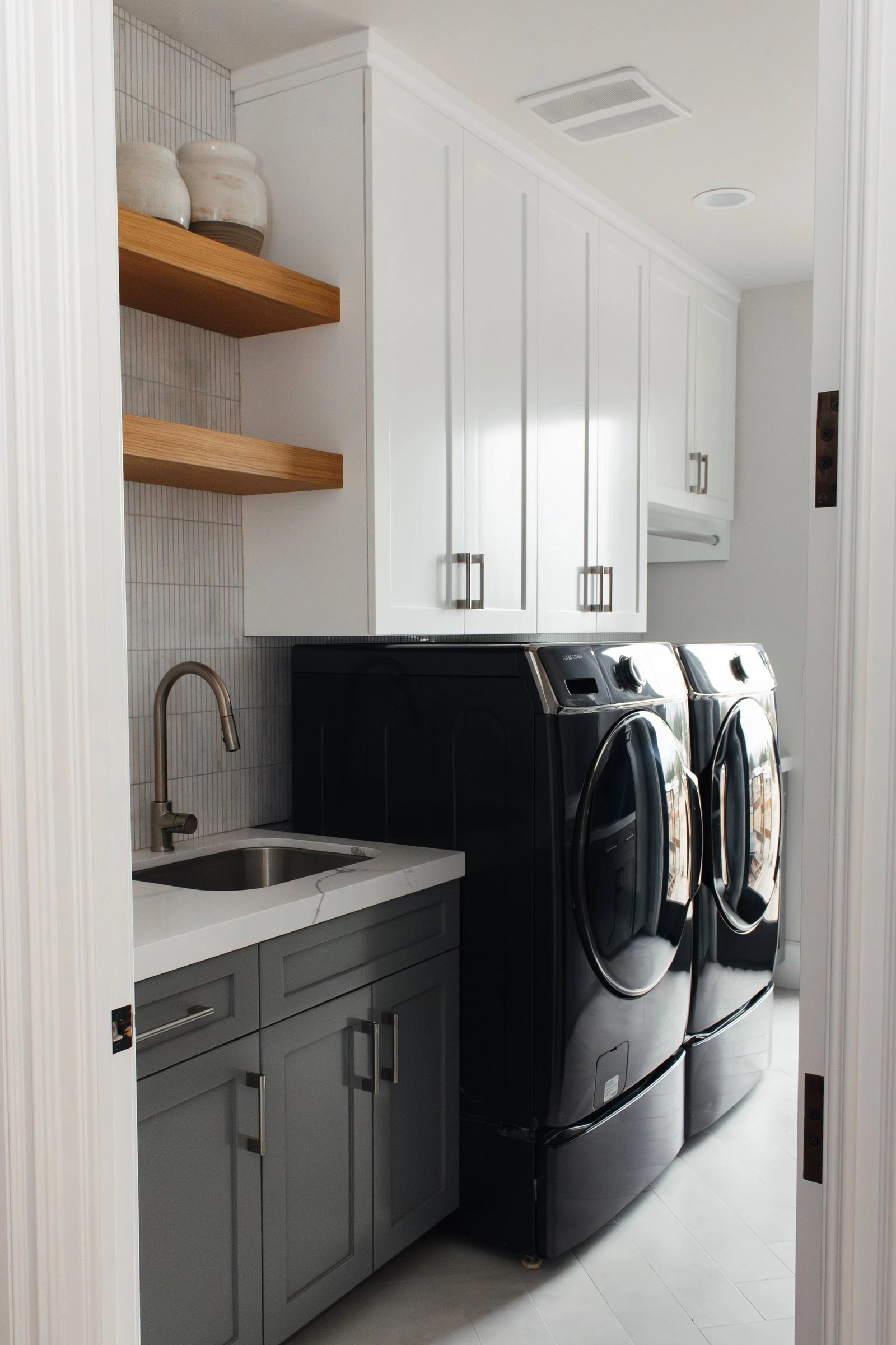 Laundry Room Cabinetry with Floating Shelves